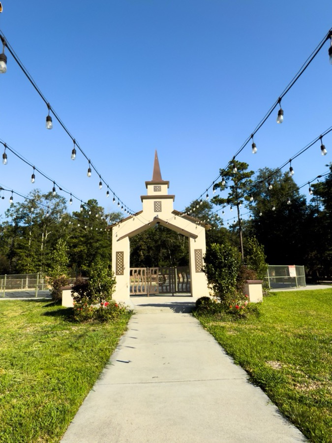 Inspira Ranch outdoor chapel close-up with string lights and clear blue sky
